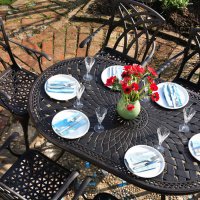 Voorvertoning: Close up the June 6 seater garden table and April chairs in antique bronze